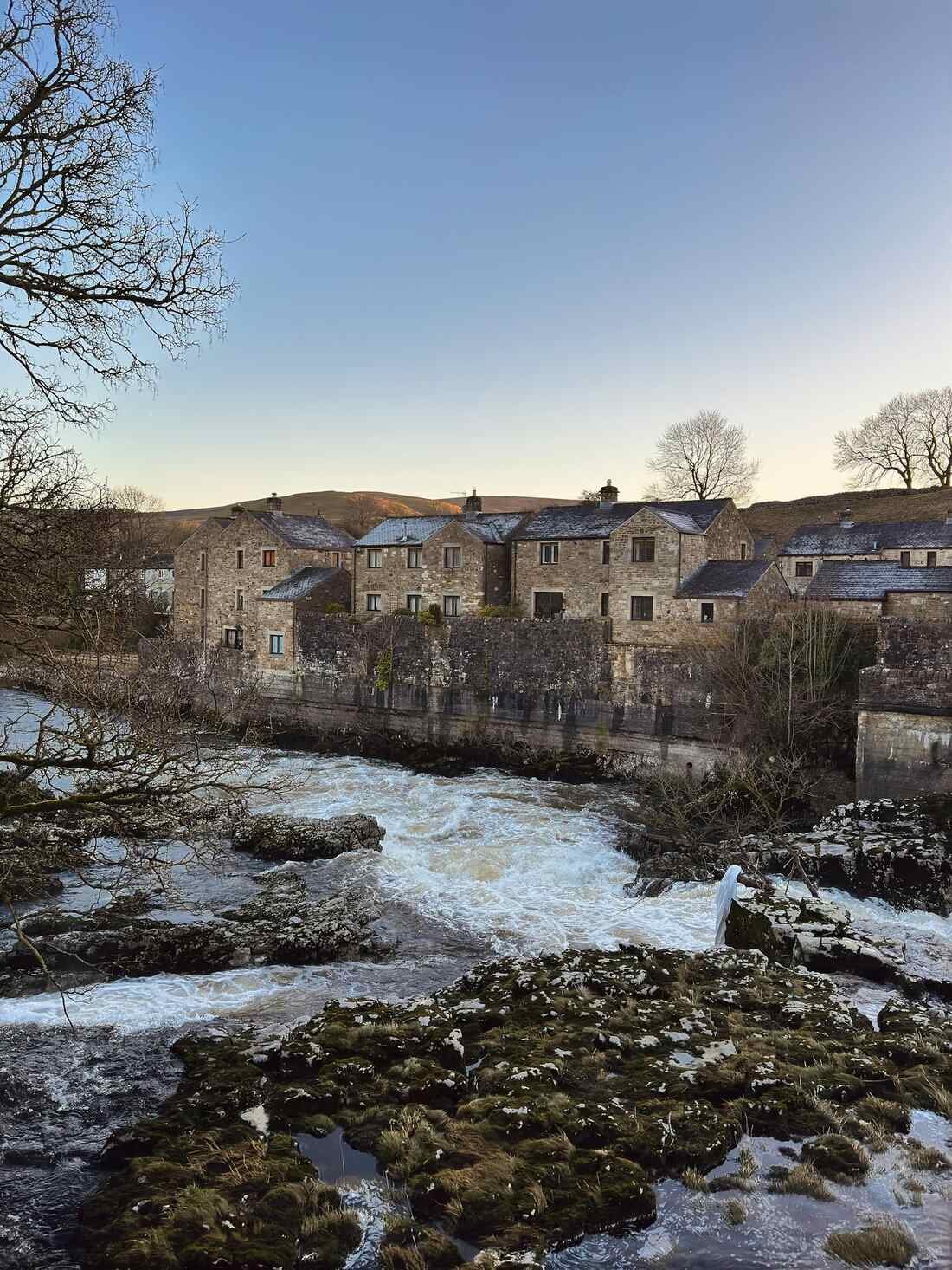Riverside stone buildings in Settle